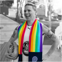 Pride Cup AFL player with rainbow scarf